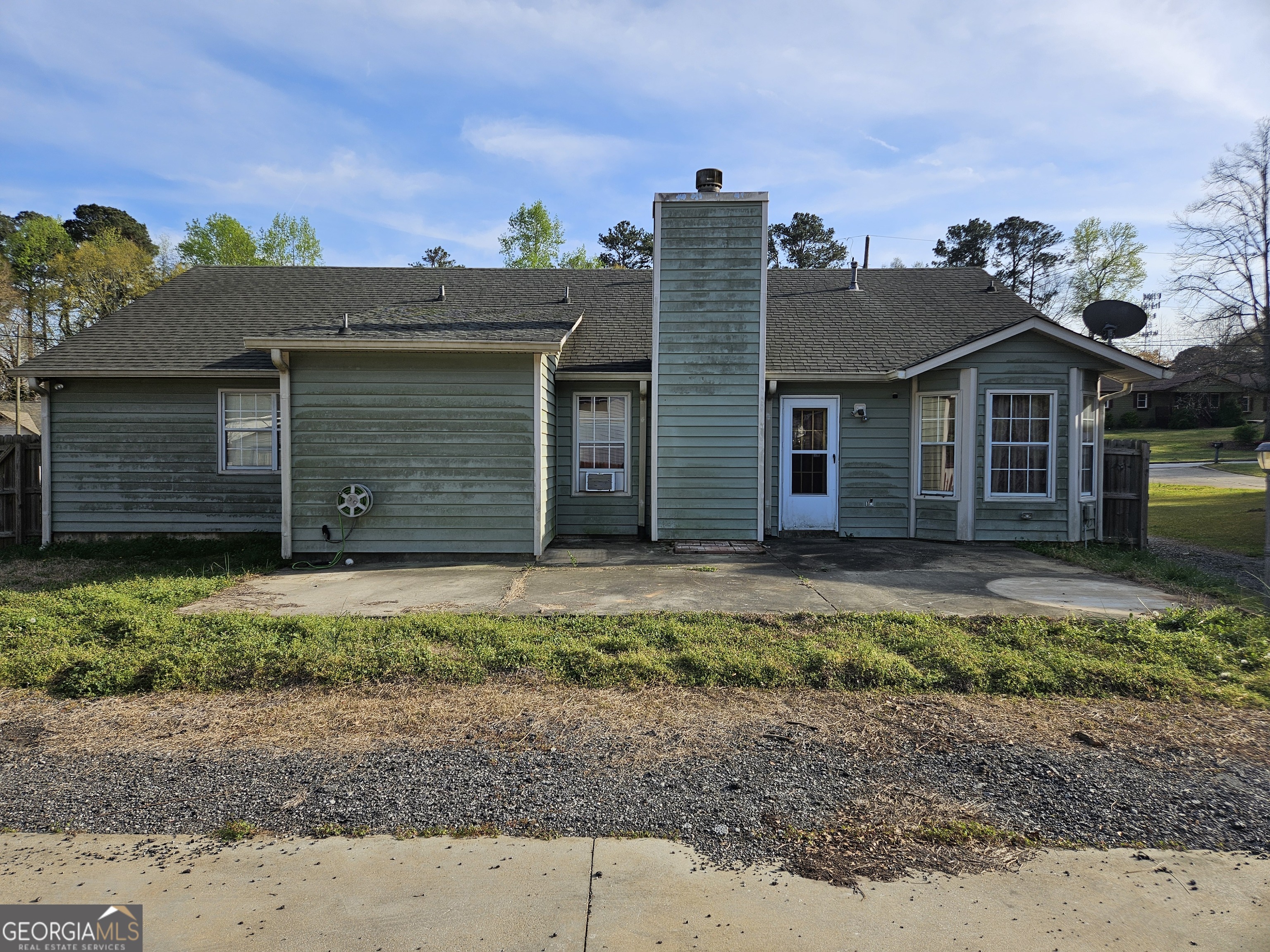 1596 Bonanza Church Road Jonesboro, GA 30236 - Photo 30 of 30 a front view of a house with a yard