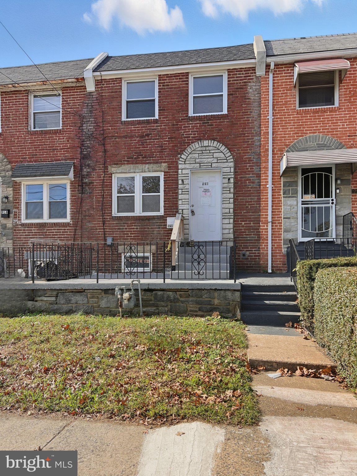 920 Butler Street Chester, PA 19013 - Photo 1 of 10 Charming brick townhouse with curb appeal.