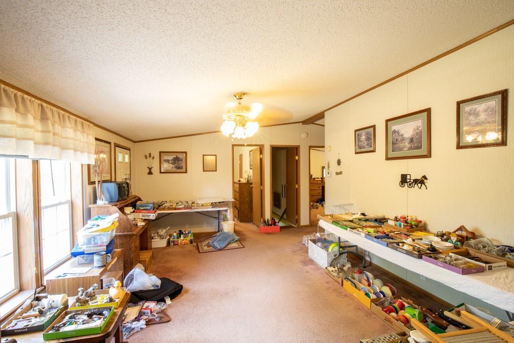 291 Bolden Road Vanderbilt, PA 15486 - Photo 5 of 12 a room with gym equipment and a large window