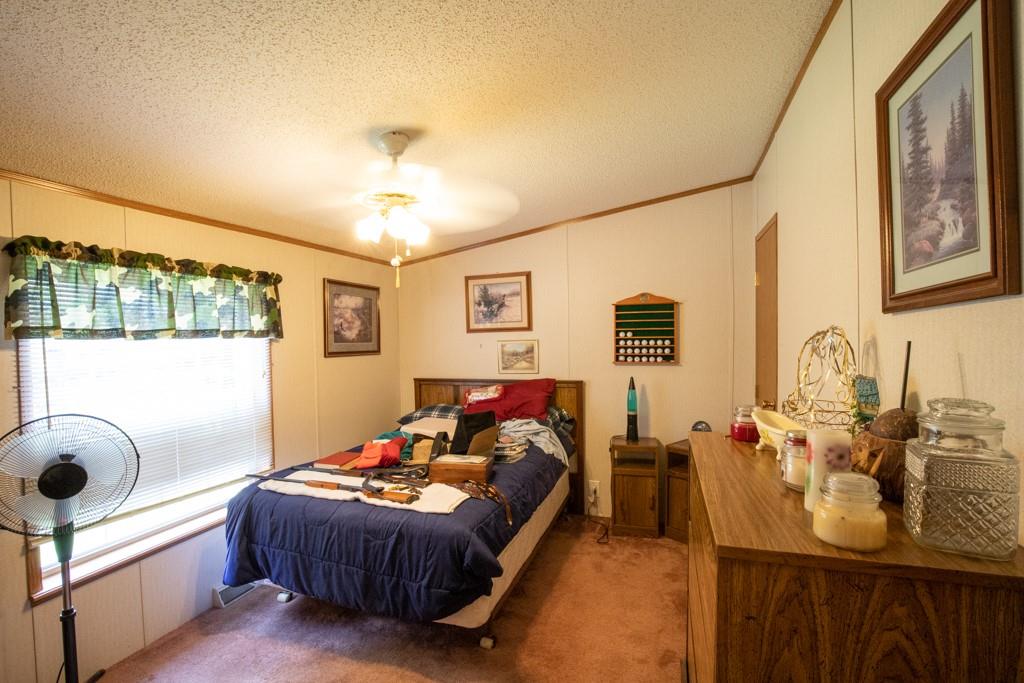 291 Bolden Road Vanderbilt, PA 15486 - Photo 8 of 12 a bedroom with furniture and a window