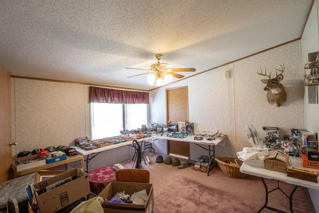 291 Bolden Road Vanderbilt, PA 15486 - Photo 9 of 12 a living room with furniture and a window