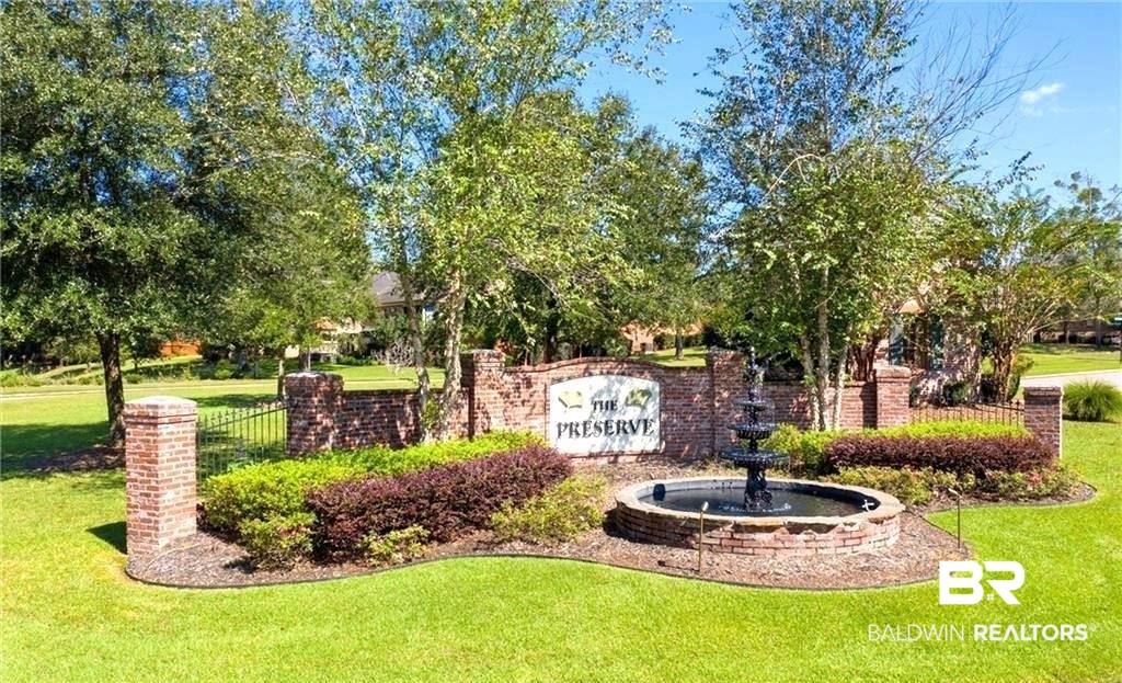 3376 Rue Bienville Mobile, AL 36693 - Photo 1 of 12 Community sign featuring a lawn