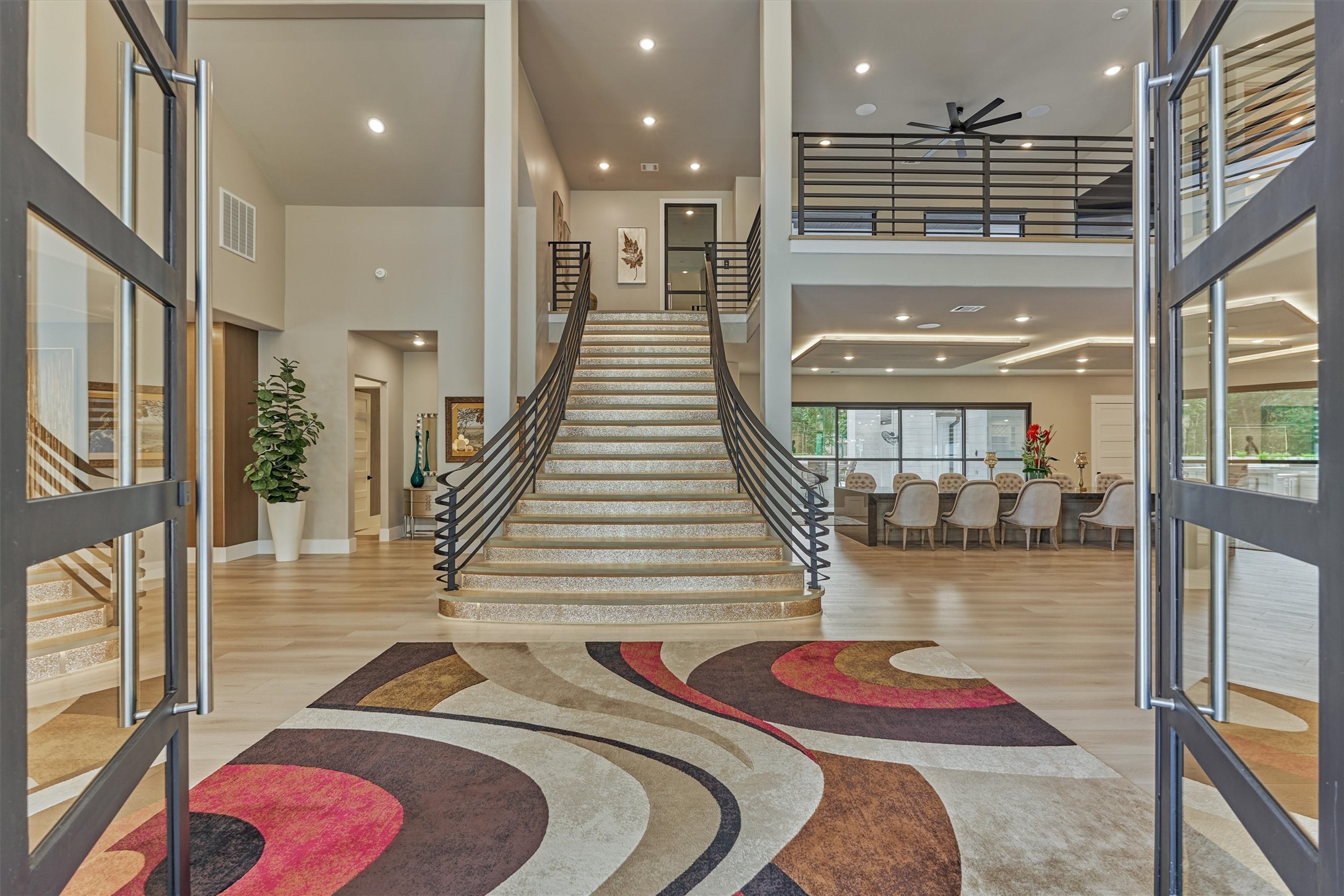 1907 Woerner Road Houston, TX 77090 - Photo 3 of 50 Jaw-dropping two-story foyer entrance showcases timeless luxury and soaring sightlines, exuding a contemporary refinement.