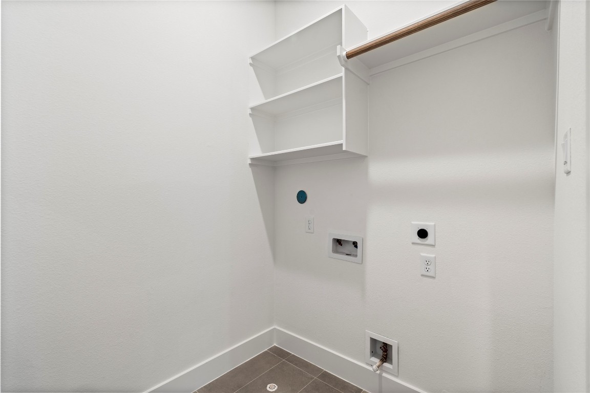 2706 Fox Street Houston, TX 77003 - Photo 32 of 39 a view of small space with racks on the wall