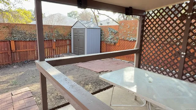 a view of a backyard space