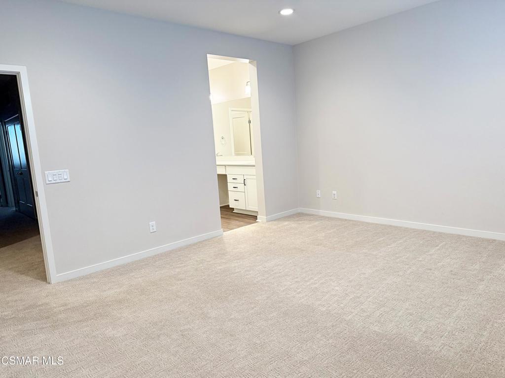 215 Red Brick Drive, Unit 5 Simi Valley, CA 93065 - Photo 11 of 30 an empty room with windows