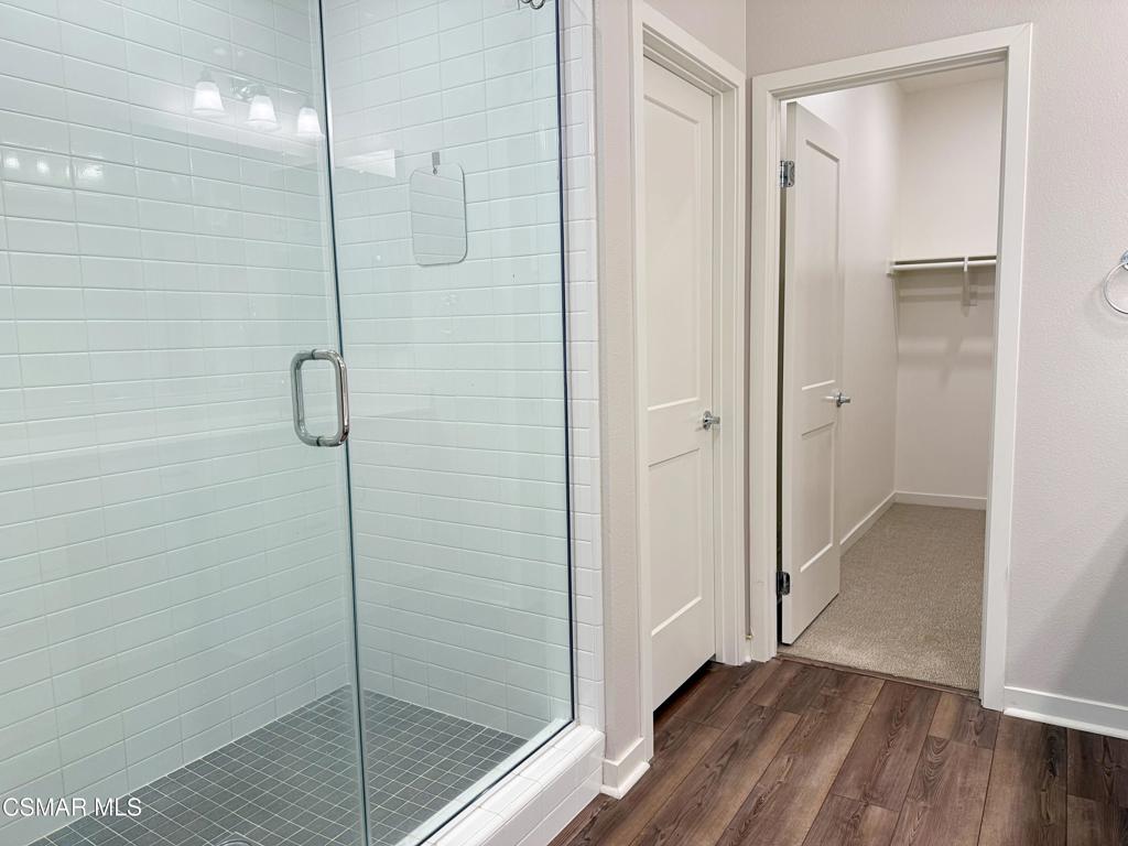 215 Red Brick Drive, Unit 5 Simi Valley, CA 93065 - Photo 14 of 30 a bathroom with a glass shower door