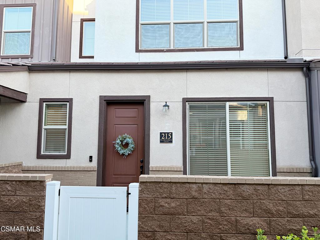 215 Red Brick Drive, Unit 5 Simi Valley, CA 93065 - Photo 23 of 30 a front view of a house with a window