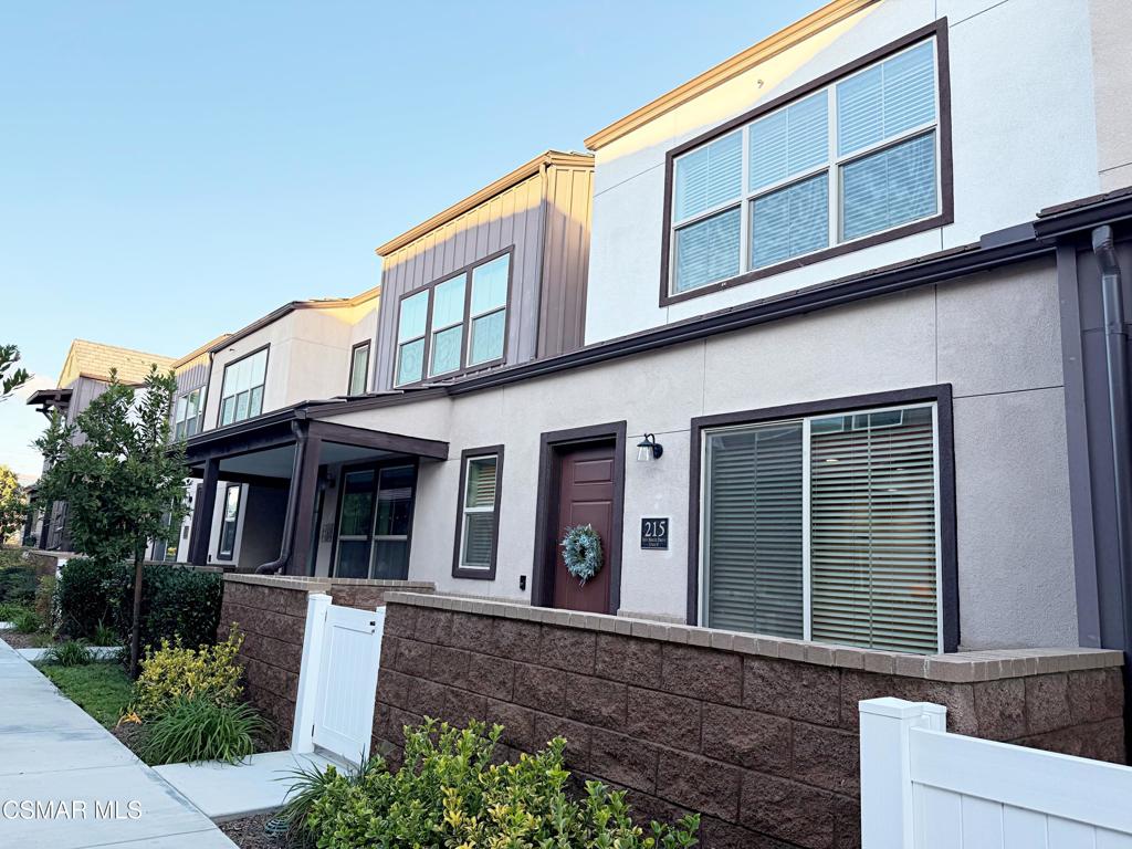 215 Red Brick Drive, Unit 5 Simi Valley, CA 93065 - Photo 24 of 30 a view of brick house with large windows