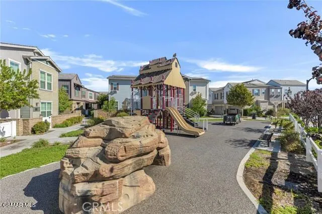 a view of a swimming pool with a yard