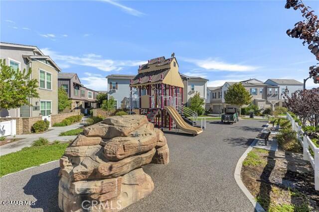 215 Red Brick Drive, Unit 5 Simi Valley, CA 93065 - Photo 26 of 30 a city street lined with tall buildings