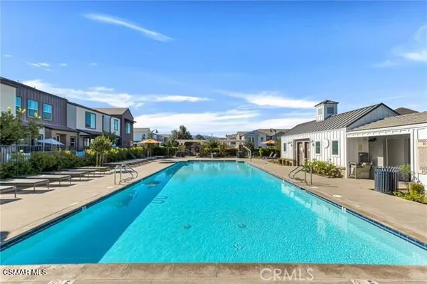 a front view of a building with garden