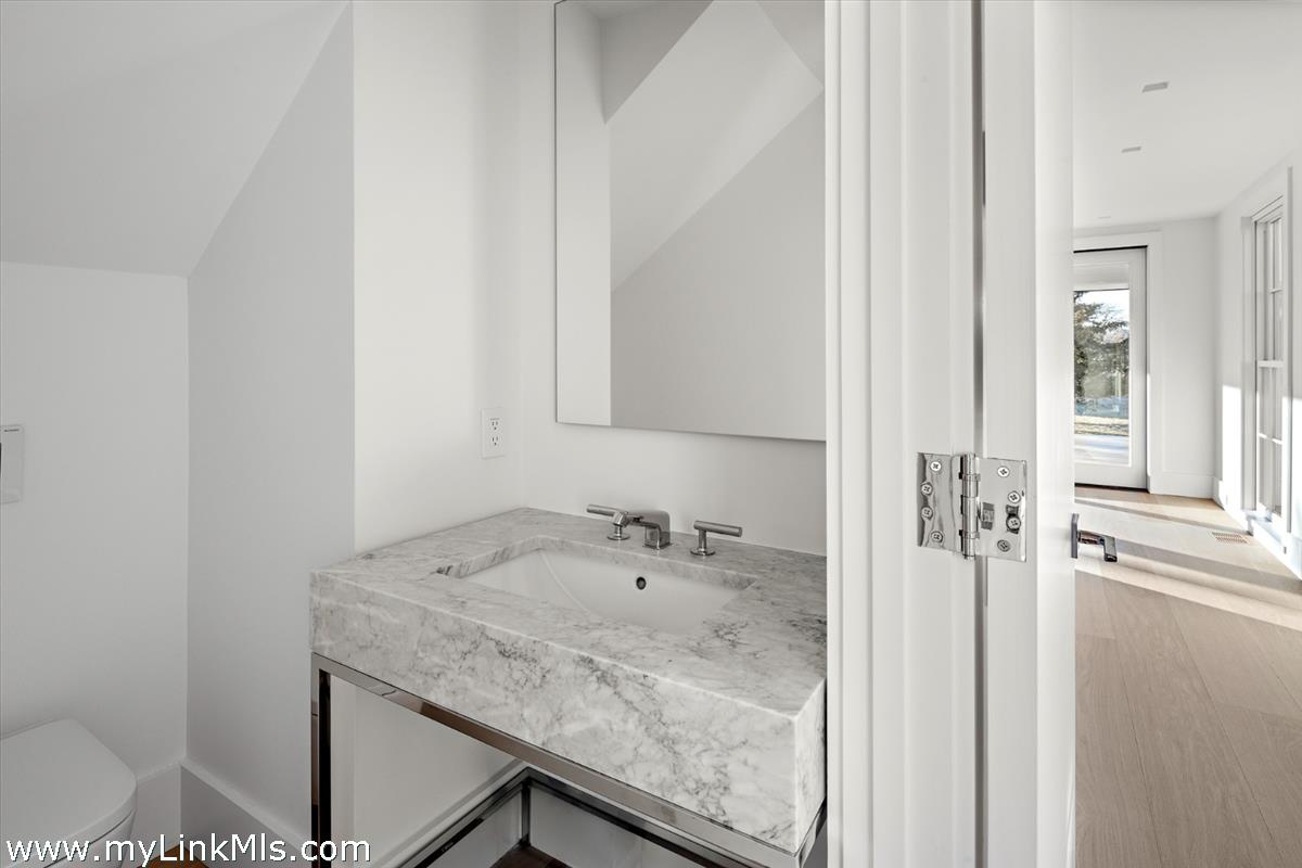 146 Quenames Road Chilmark, MA 02535 - Photo 22 of 77 The Farmhouse Powder room between the dining & living rooms