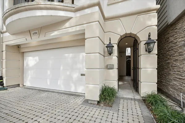 a view of entrance gate of a house
