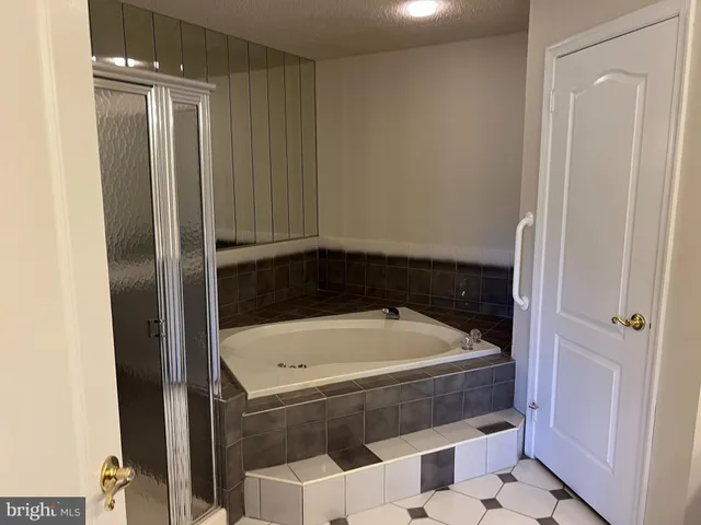 a bathroom with a bathtub