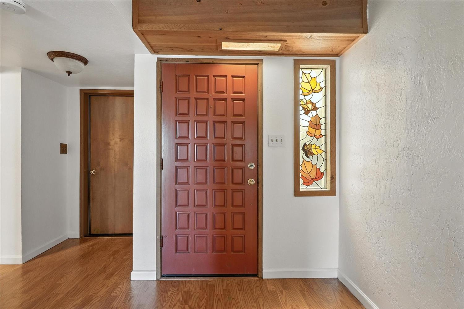 42480 Ranger Cir Way Coarsegold, CA 93614 - Photo 2 of 40 a view of front door with wooden floor