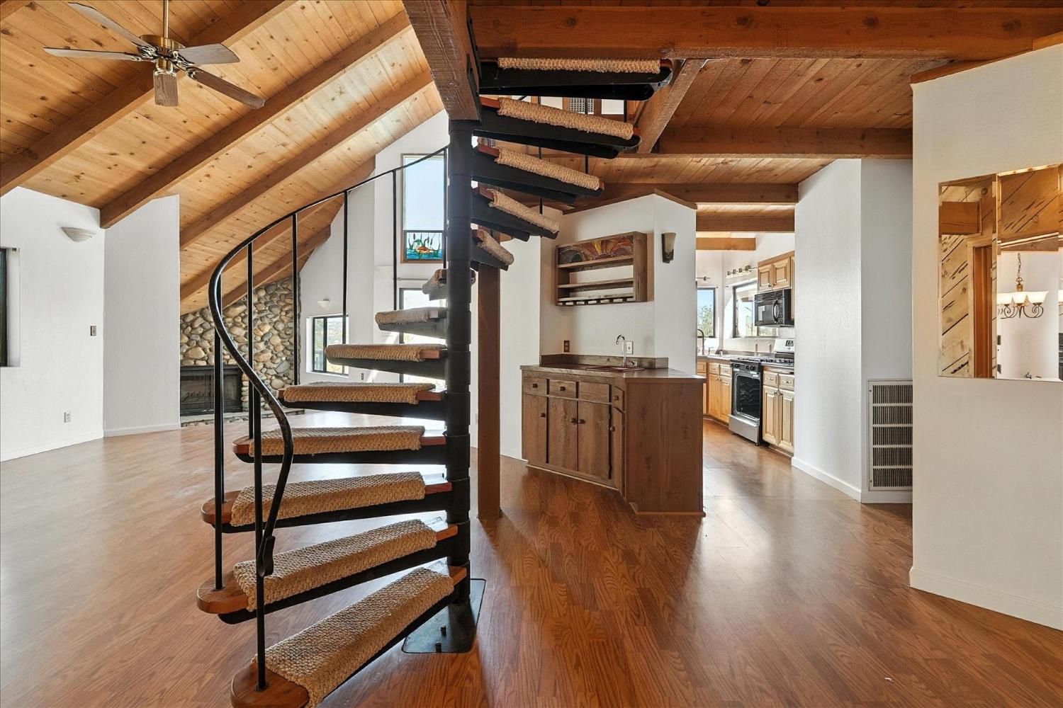 42480 Ranger Cir Way Coarsegold, CA 93614 - Photo 23 of 40 a view of entryway and hall with wooden floor