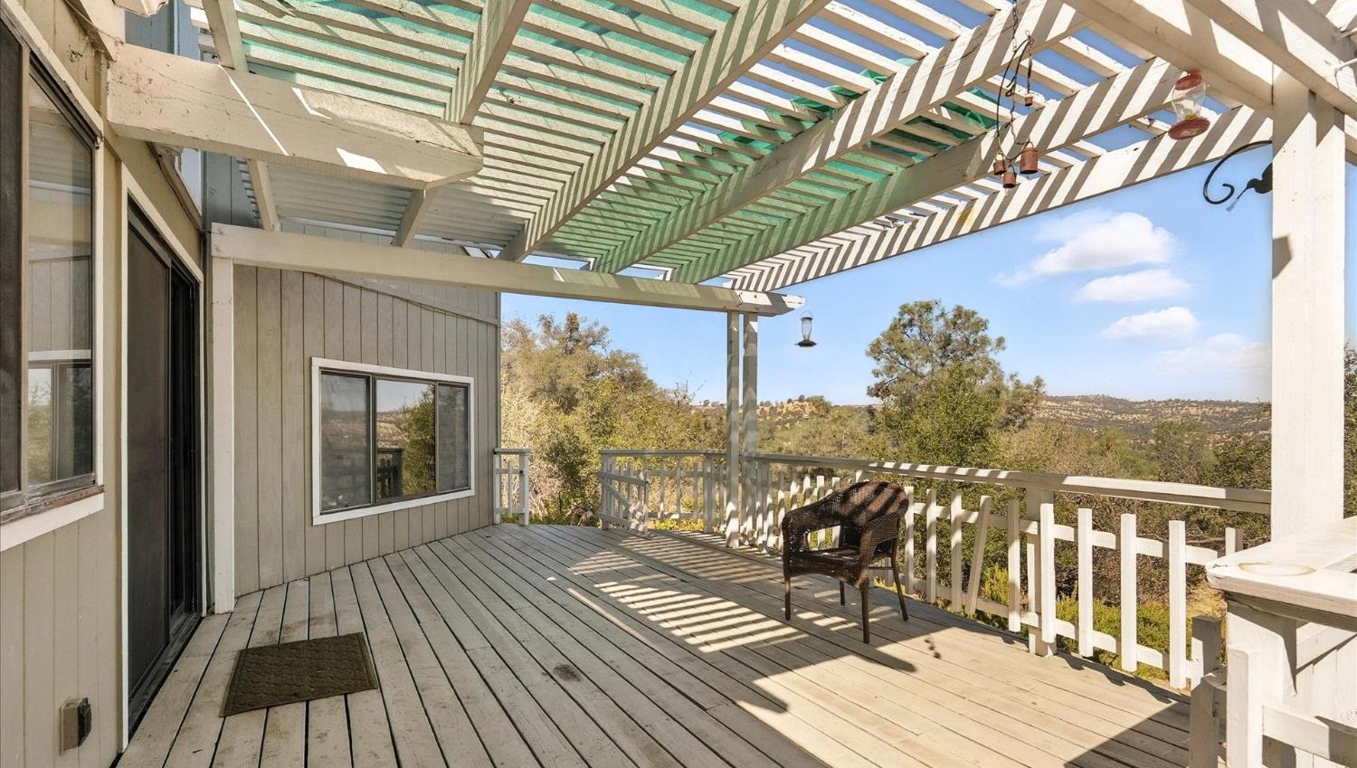 42480 Ranger Cir Way Coarsegold, CA 93614 - Photo 31 of 40 a view of a balcony with chairs