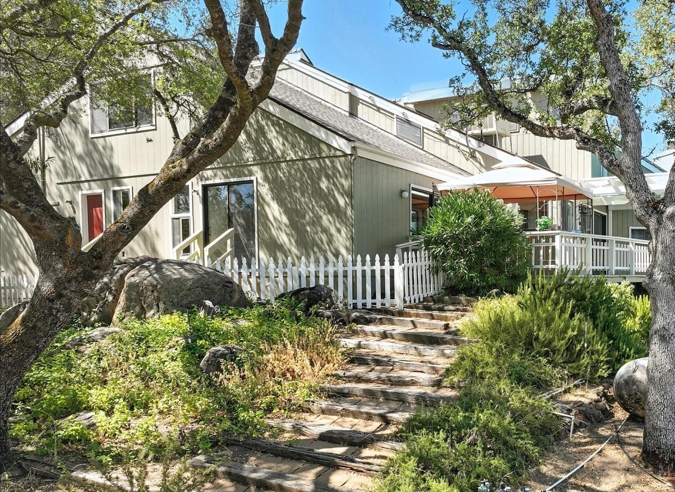 42480 Ranger Cir Way Coarsegold, CA 93614 - Photo 33 of 40 a front view of a house with a yard