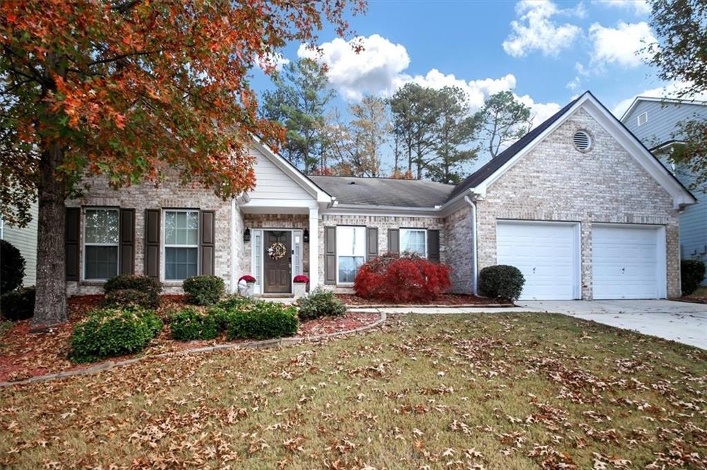 842 Bishops Run Lane Mableton, GA 30126 - Photo 1 of 1 a view of house with backyard and garden