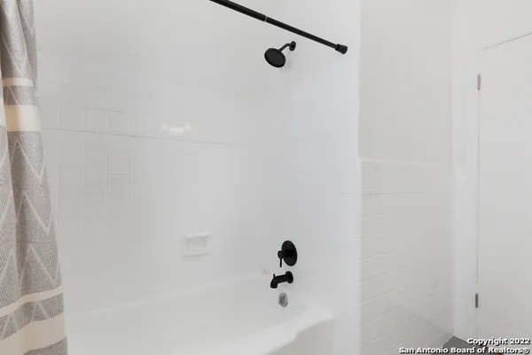 a bathroom with a bathtub