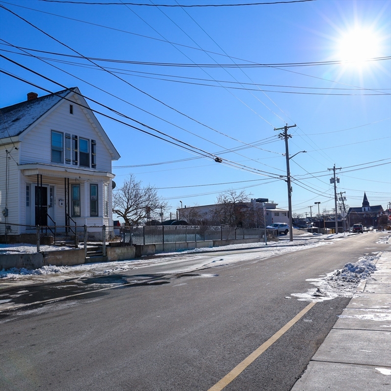 186 Powell Street Lowell, MA 01851 - Photo 8 of 42 a view of a street