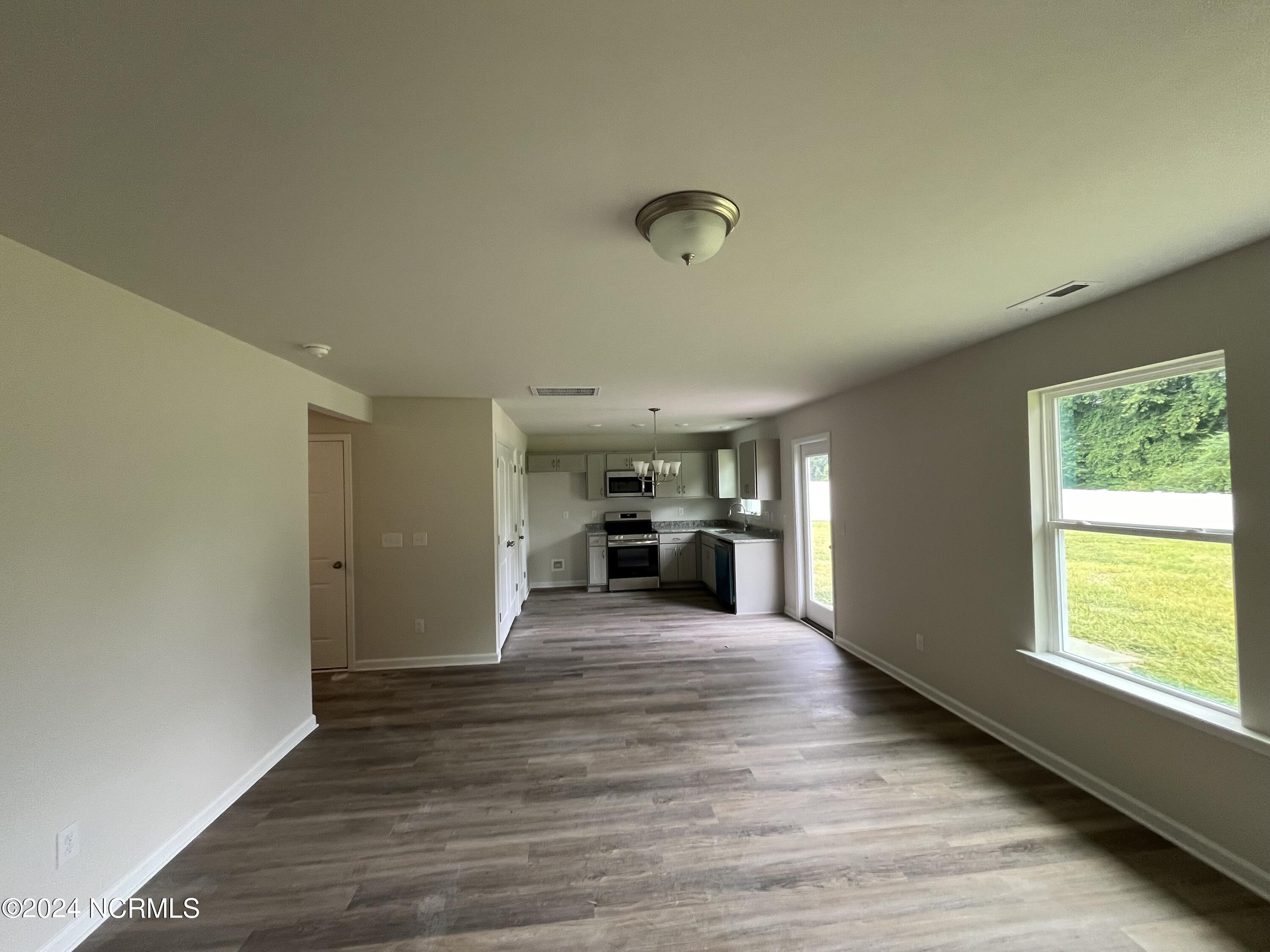 1126 Beaver Creek Road Deep Run, NC 28525 - Photo 7 of 16 Kitchen from Familyroom