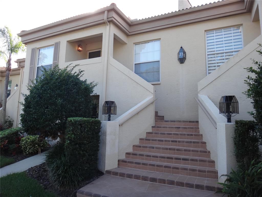 4493 Longmeadow, Unit 76 Sarasota, FL 34235 - Photo 2 of 24 a view of entryway with yard