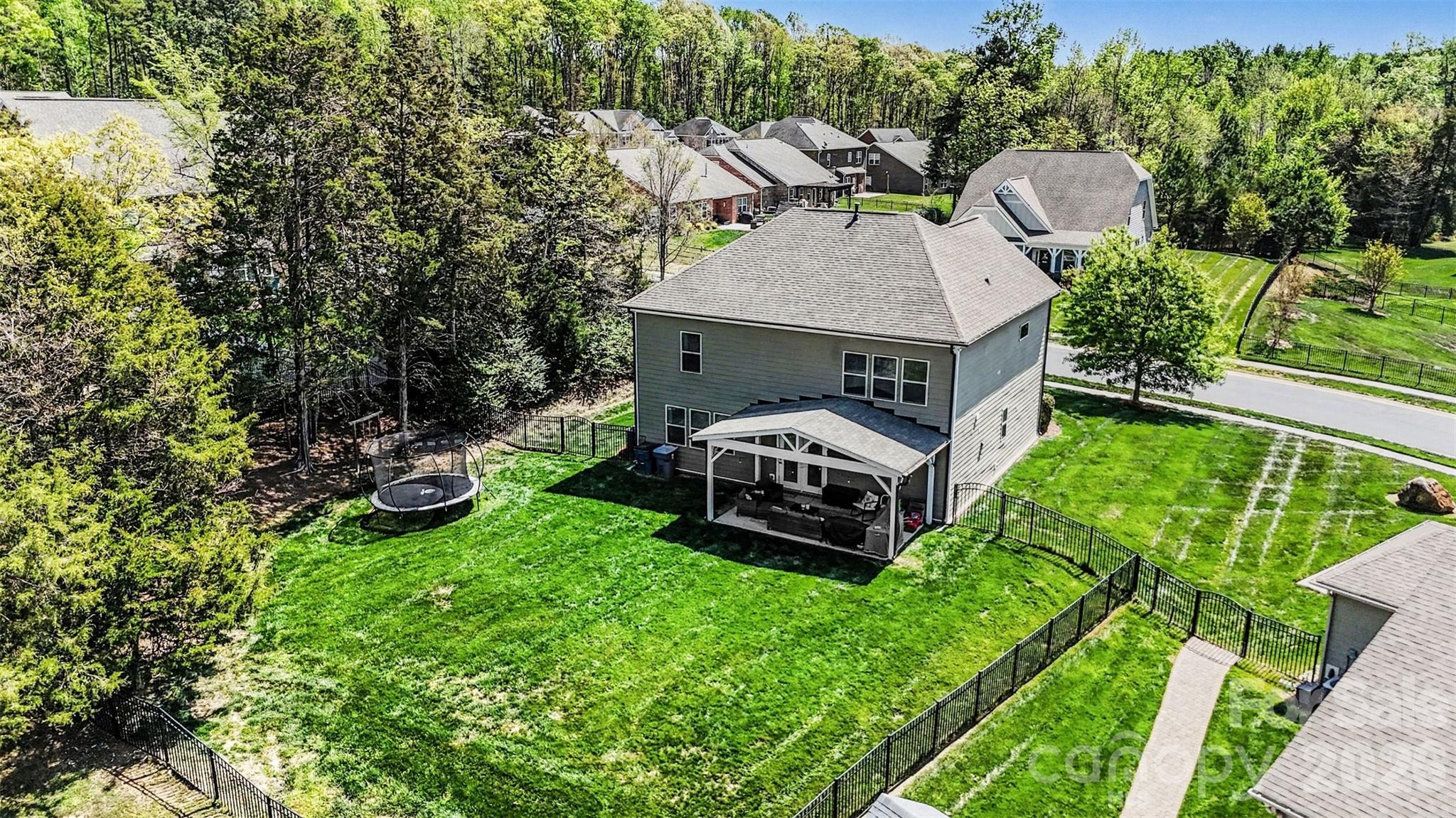 514 Tack Lane Midland, NC 28107 - Photo 42 of 48 an aerial view of a house with garden space and street view