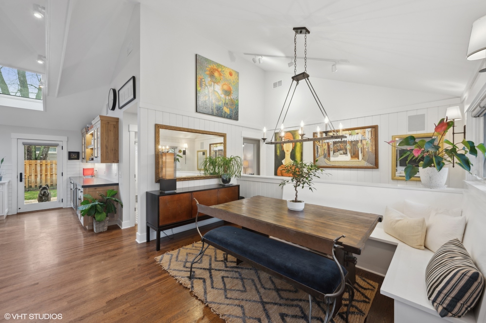 252 Riverside Drive Northfield, IL 60093 - Photo 11 of 23 a living room with furniture a chandelier and a table