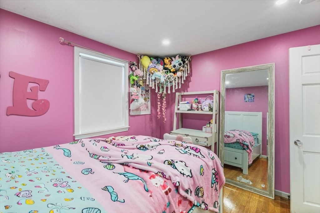 11 Harriman Road Merrimac, MA 01860 - Photo 20 of 31 a bedroom with a bed and a dresser