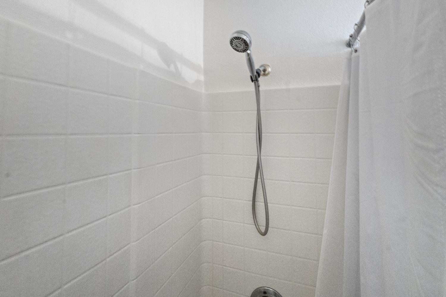 1413 Villette Court Modesto, CA 95356 - Photo 23 of 82 a bathroom with a shower