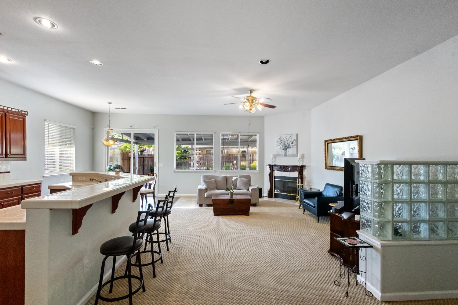 1413 Villette Court Modesto, CA 95356 - Photo 4 of 82 a view of a dining room with furniture window and wooden floor