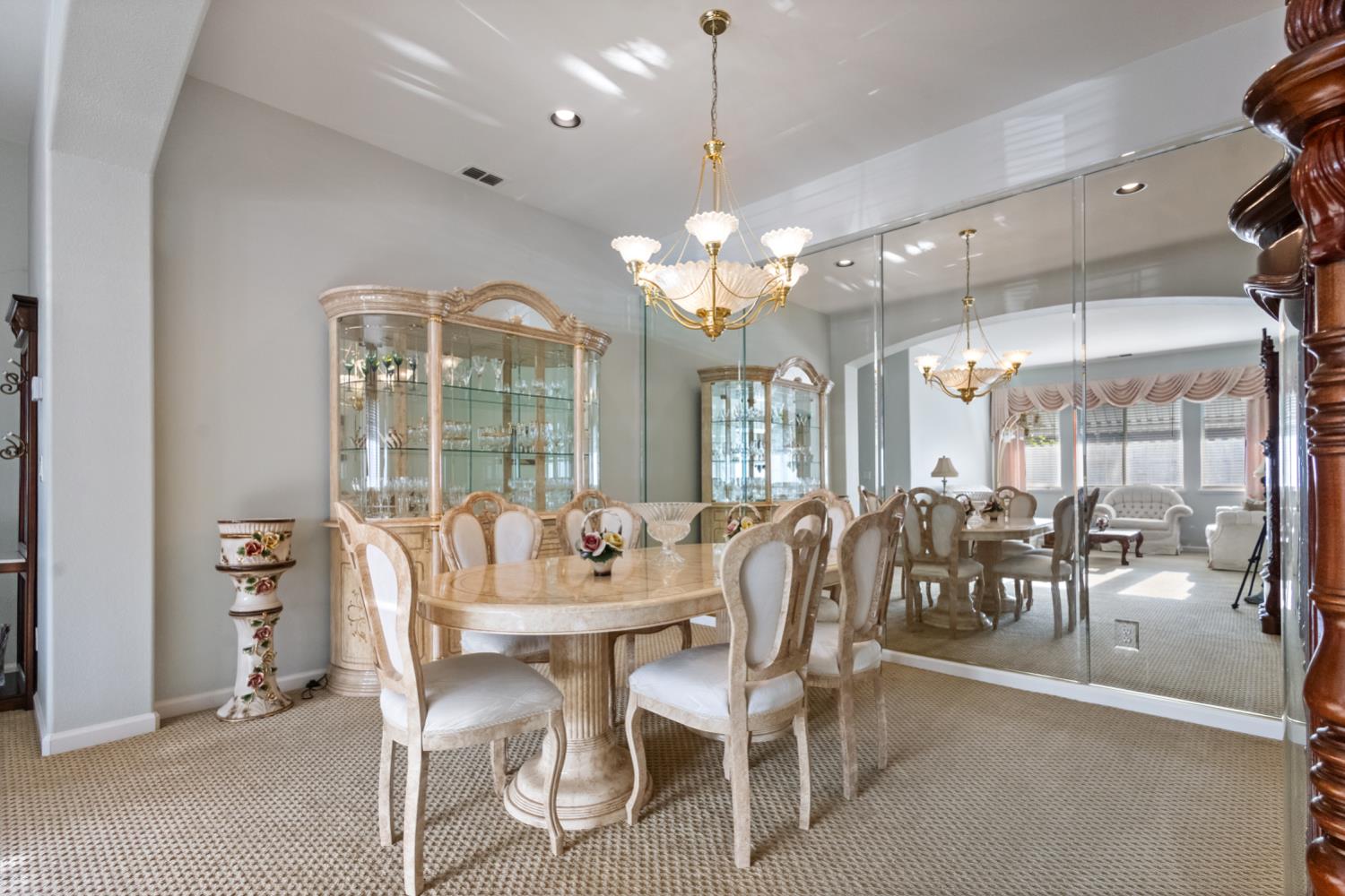 1413 Villette Court Modesto, CA 95356 - Photo 50 of 82 a view of a dining room with furniture and chandelier