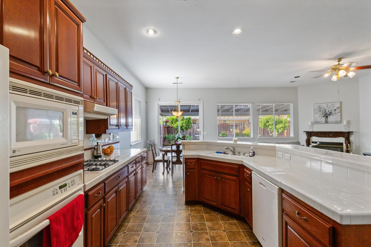 1413 Villette Court Modesto, CA 95356 - Photo 71 of 82 a kitchen with lots of counter top space and appliances