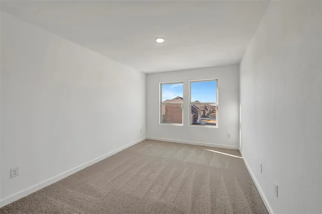 a bathroom with a sink toilet vanity and shower