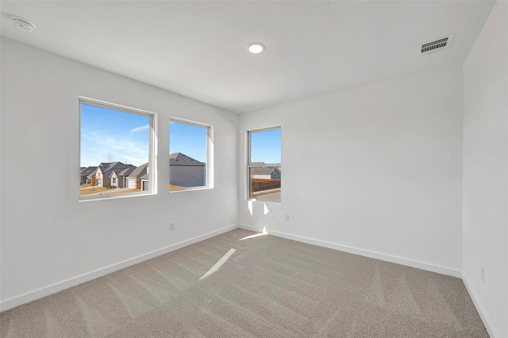 2217 Maple Ridge Drive Van Alstyne, TX 75495 - Photo 31 of 38 a view of an empty room with a window