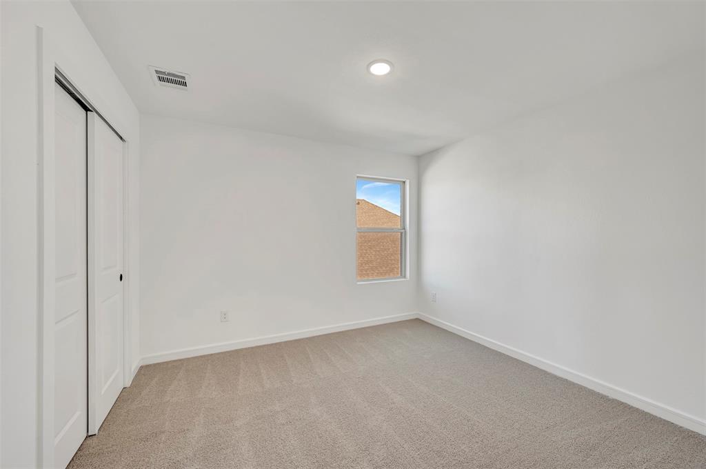 2217 Maple Ridge Drive Van Alstyne, TX 75495 - Photo 32 of 38 a view of an empty room and window