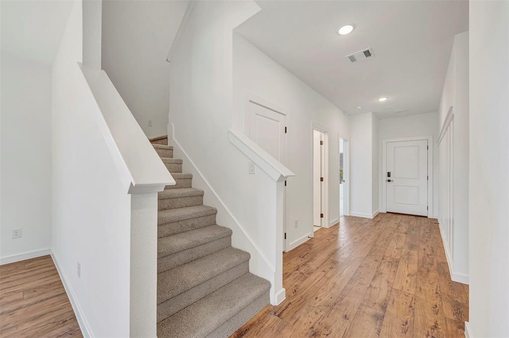 2217 Maple Ridge Drive Van Alstyne, TX 75495 - Photo 5 of 38 a view of entryway with wooden floor