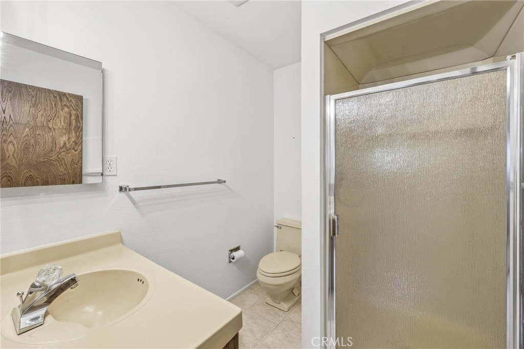 37295 Oak View Road Yucaipa, CA 92399 - Photo 20 of 59 a bathroom with a sink toilet and shower