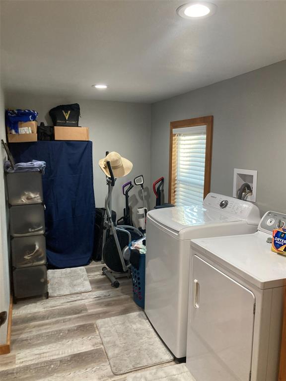 248 Shaffer Road Denison, TX 75021 - Photo 18 of 40 a room with storage and utility