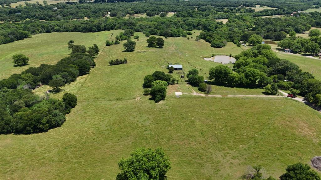 248 Shaffer Road Denison, TX 75021 - Photo 20 of 40 a view of a lake with a houses