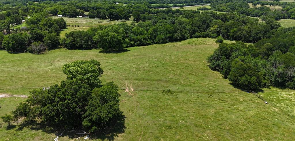 248 Shaffer Road Denison, TX 75021 - Photo 23 of 40 a view of a garden with a lake