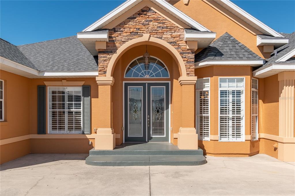 12610 Northwest Gainesville Road Reddick, FL 32686 - Photo 12 of 90 a view of entrance of the house