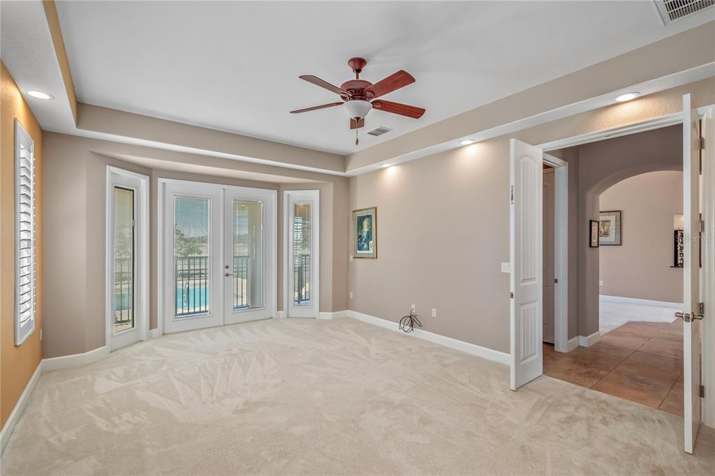 12610 Northwest Gainesville Road Reddick, FL 32686 - Photo 19 of 90 a view of a livingroom with a ceiling fan and window