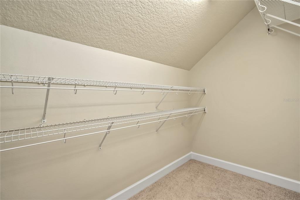 12610 Northwest Gainesville Road Reddick, FL 32686 - Photo 55 of 90 a view of a room with racks on the wall