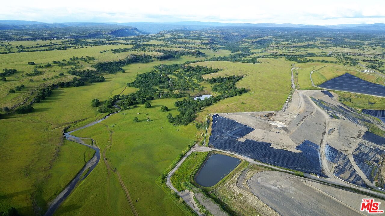 a view of a city with an ocean
