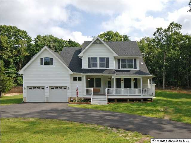 78 Ely Harmony Road Freehold, NJ 07728 - Photo 1 of 3 a front view of a house with a yard