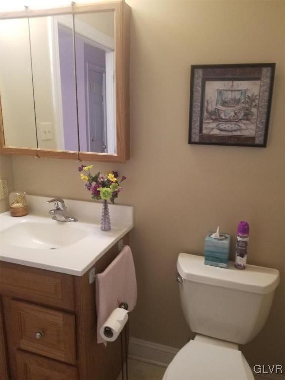 2227 Main Street Northampton, PA 18067 - Photo 21 of 31 a bathroom with a toilet sink and mirror