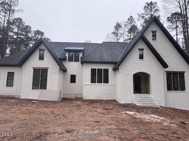 1187 Old Lystra Road Chapel Hill, NC 27517 - Photo 1 of 6 a view of a house with a yard